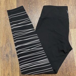 Black leggings with white stripes